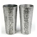 (lot of 2) Wendell August pewter water glasses, each having insized foliate decoration on a hammered