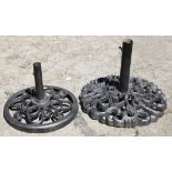 (lot of 2) Modern black painted metal umbrella stands, each having scrolled decoration, 17.5"h