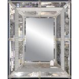 Venetian mirror, having a rectangular looking glass and etched glass acanthus motifs, 40"h x 32"w