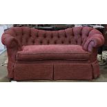 Chesterfield style tufted sofa, having a shaped back, reupholstered by Kay Chesterfield, Oakland,