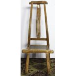 Chinese wooden low chair, shaped back rail with a tall back splat, and a woven rectangular seat,