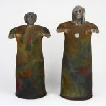 Pair of raku decorated ceramic figures, each depicting a Native American, one a woman, one a male