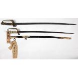 (lot of 2) Japanese ceremonial sword, ray skin handle, black lacquered saya, the wooden tag reads "