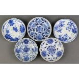 (lot of 5) Chinese underglaze blue porcelain dishes: three with peony scrolls; one with various