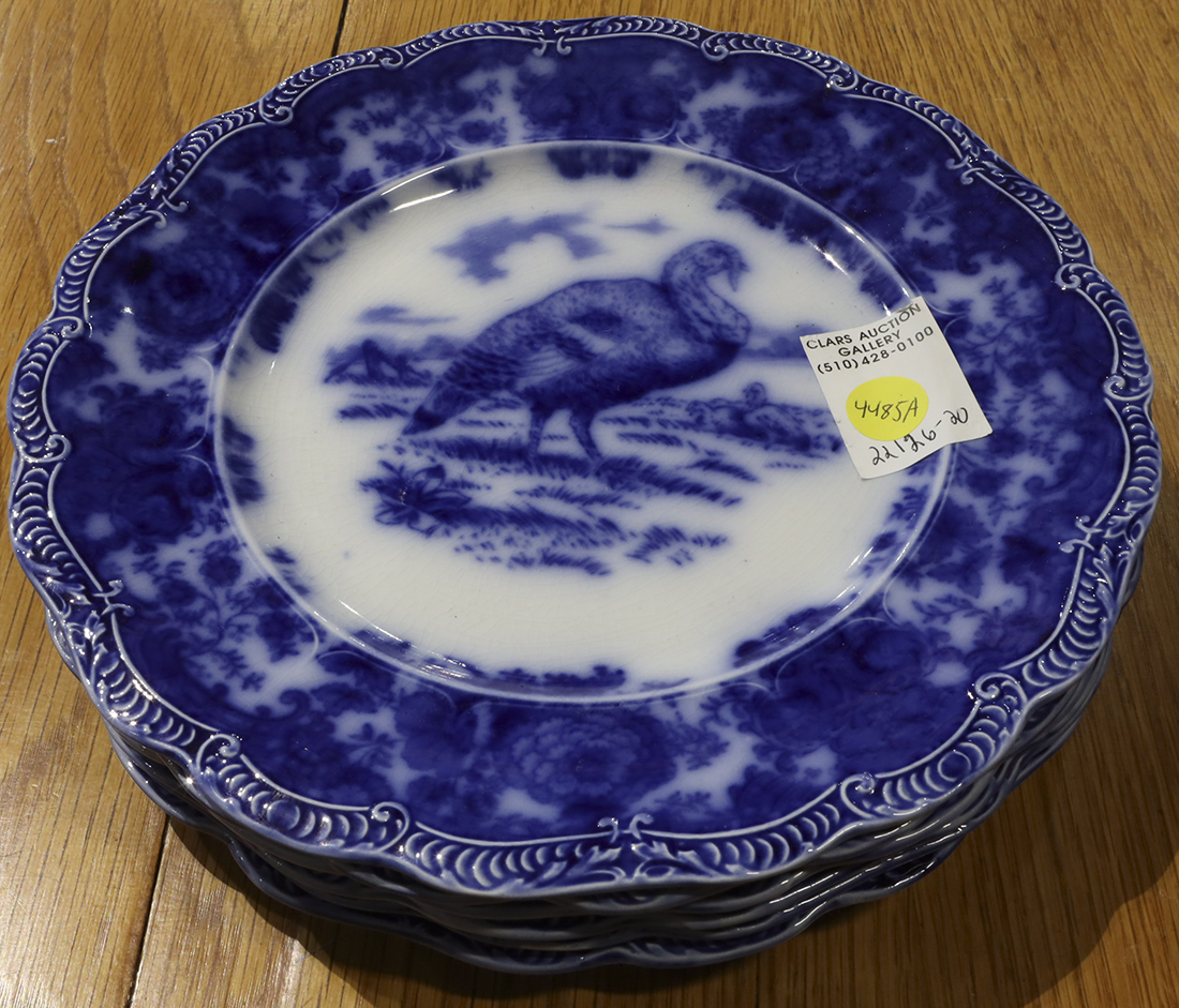 (lot of 6) English Ridgeway blue and white flow blue plates, the shaped border framing the turkey,