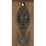 Papau New Guniea Iatmul decorative food hook, 20th Century, well carved with inset shell eyes, 37.