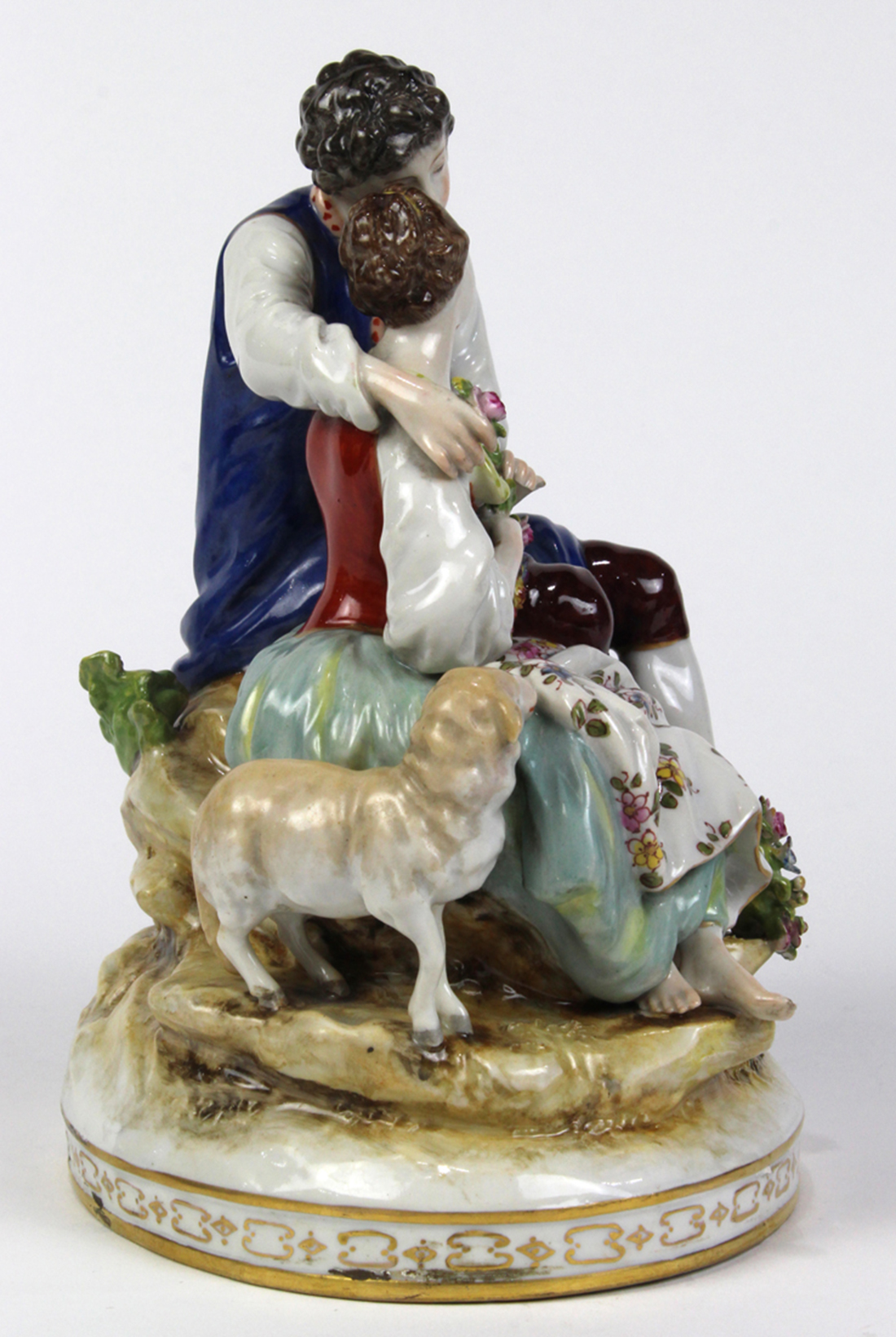 Continental porcelain sculpture depicting a courting couple, depicted seated on a rock form, the - Image 2 of 5