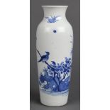 Chinese underglaze blue porcelain small sleeve vase, featuring a pair of birds amid flowering