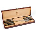 (lot of 8) Cased German Zwilling J.A. Henckels steak knives, executed in stainless steal with a