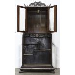 Chinese wooden curio cabinet, having an openwork floral crown above the upper portion fronted by a