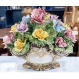 Italian Capodimonte urn, covered urn with a partial gilt body with floral reserves, surmounting