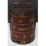 Chinese three tiered food basket, the circular lid featuring three figures in gilt, 23.75"h