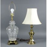 (lot of 2) Lamp group, consisting of a shouldered glass lamp, together with a brass example, largest