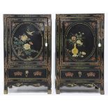 (lot of 2) Chinese overlaid lacquered cabinets, each fronted by a hinged door featuring flowers,