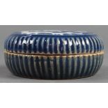 Chinese blue-and-white porcelain circular box, the lid molded with a dragon reserve on a blue