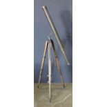 Brass terrestrial surveying telescope, rising on an adjustible wood turned tripod, 4'10''h