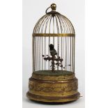 French singing bird automaton, the single bird housed in a gilt case marked Made In France, 11.5"h x