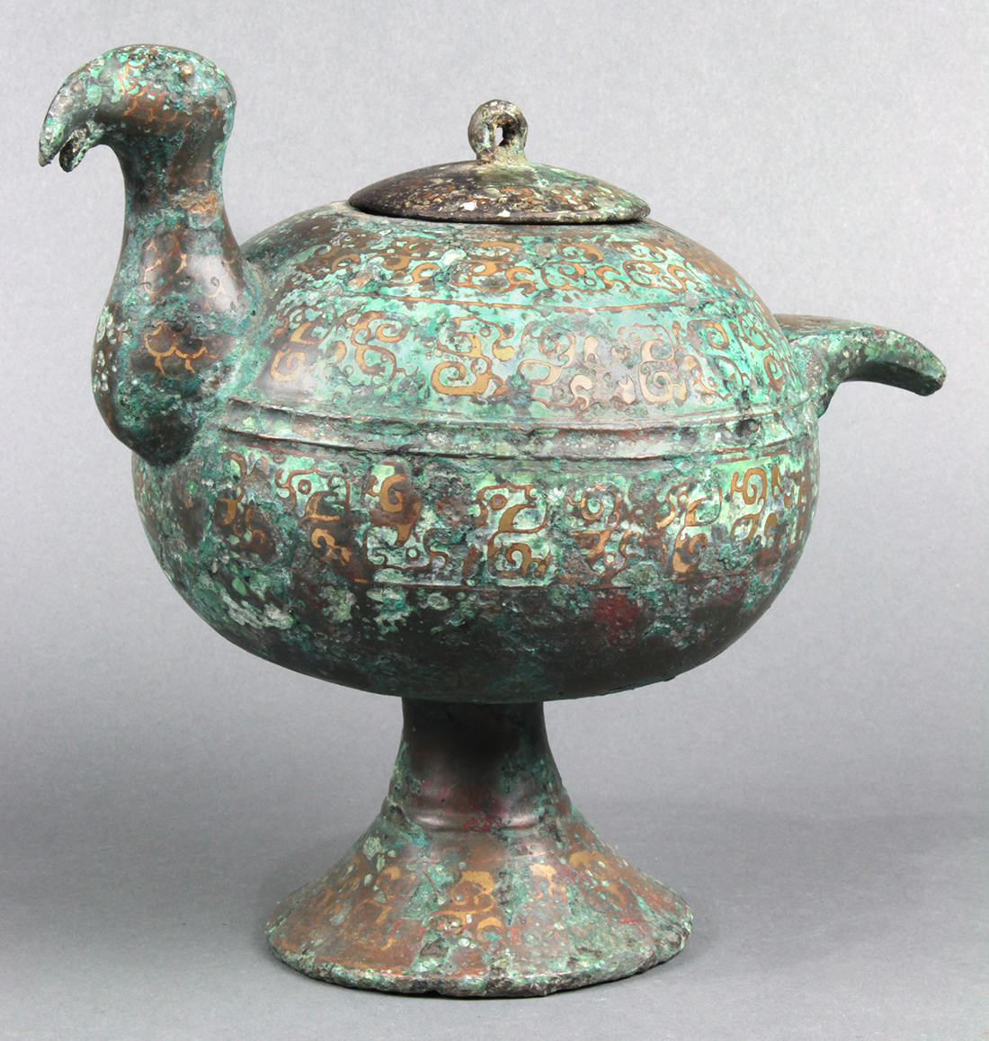 Chinese inlaid bronze archaistic lidded vessel, of bird form with an globular body raised on a