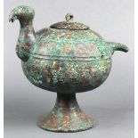 Chinese inlaid bronze archaistic lidded vessel, of bird form with an globular body raised on a