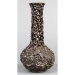 Chinese wooden stick neck vase, the long neck of openwork construction, above an ovoid body,