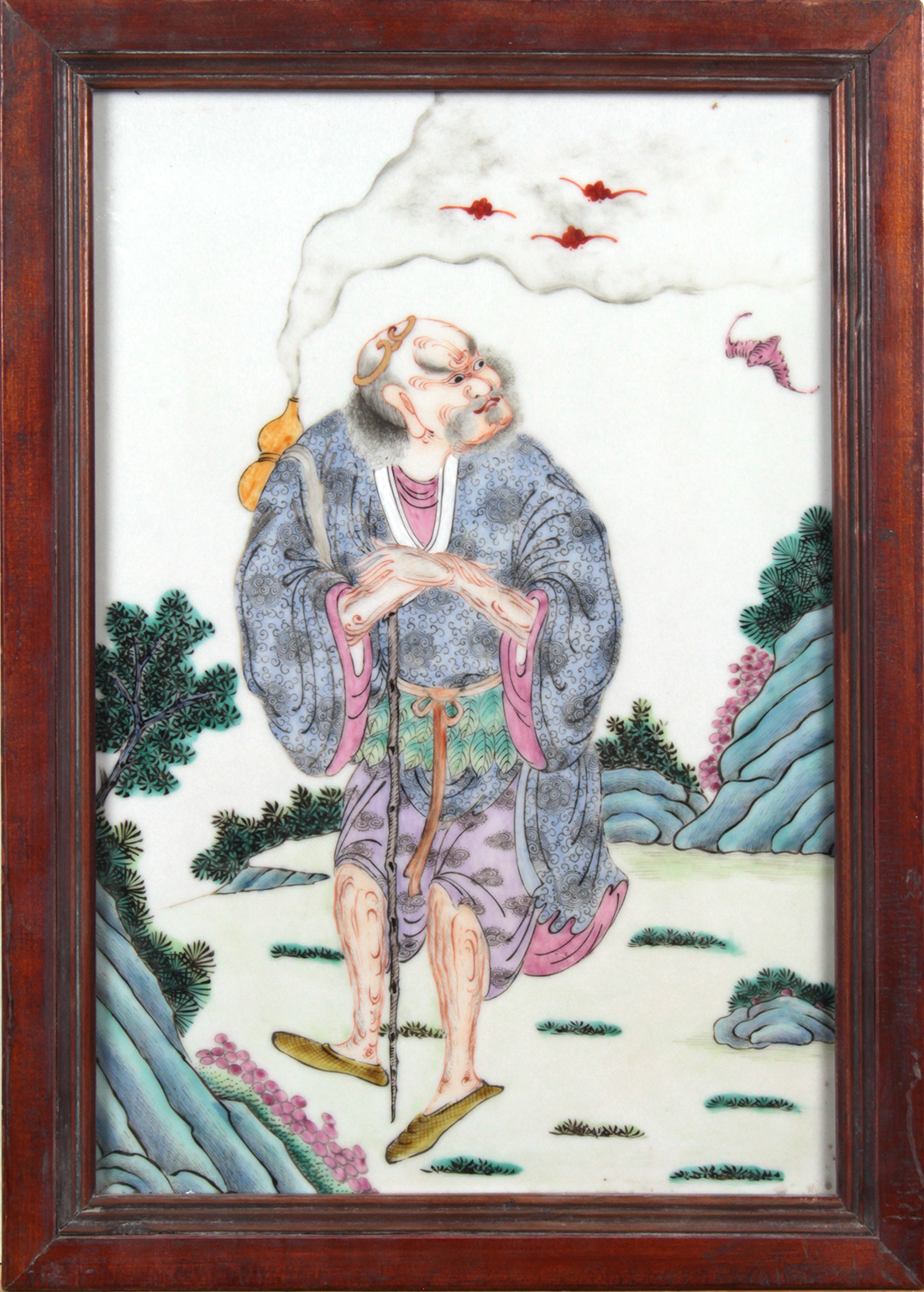 Chinese framed enamel porcelain plaque, featuring Tie Guai Li of the Eight Immortals in landscape,