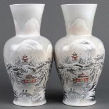 Pair of Chinese enameled porcelain vases, of a snowy landscape with figures and pavilions,