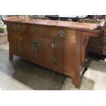 Chinese hardwood coffer, with a row of three drawers above a pair of hinged double doors, flanked by