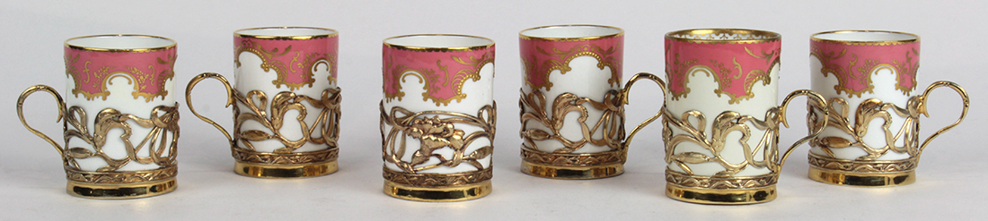 Cased Royal Crown Derby demitasse set for six, having a pink border with gilt accents on a white - Image 2 of 5