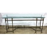 Console table, having a plate glass top above the brass base with swans neck supports, 25"h x 58"w x