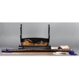 (lot of 8) Japanese lacquered katana stand, landscape in makie on black lacquer; two silk katana