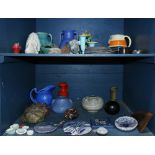 Two shelves of assorted table articles, consisting of ceramic bowls, vases, pitchers, and tiles; (9)