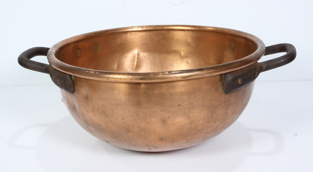 Copper candy bowl, likely French circa 1860, having a rolled rim with rivet fastened wrought iron