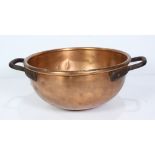 Copper candy bowl, likely French circa 1860, having a rolled rim with rivet fastened wrought iron