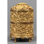 Chinese gilt alloy tiered censer, the openwork lid with and the exterior of the cylindrical tiers
