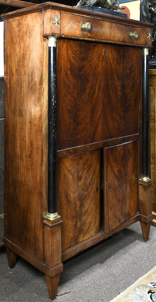 Empire mahogany secretaire, Dutch or French circa 1810, having a rectangular top with a single