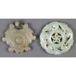 (lot of 2) Chinese hardstone toggles: first, with a movable disc incised shou to the center; second,