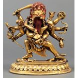 Sino-Tibetan gilt bronze Buddhist sculpture, the ten-armed Mahakala embracing his shakti and