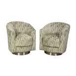 Pair of Vladmir Kagan swivel armchairs