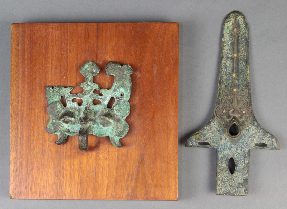 (lot of 2) Chinese bronze items: first, a taotie form handle, set on a wood plaque; second, a