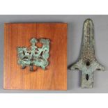 (lot of 2) Chinese bronze items: first, a taotie form handle, set on a wood plaque; second, a