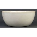Chinese large white glazed ceramic bowl, the interior incised with lotus sprigs, 9"w