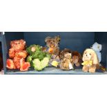One shelf of Steiff animals, including "Mohair Zotty," together with lions, dogs, and red and