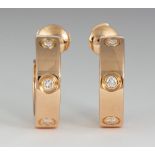Pair of Cartier diamond and 18k rose gold earrings