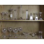 Two shelves of crystal comprising three piece Villeroy & Boch candlesticks; pairs of Baccarat and