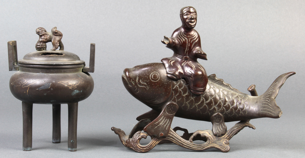 (lot of 2) Japanese bronze censers: one of immortal riding on a koi carp, the other censer on tripod
