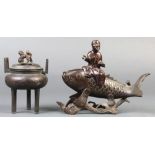 (lot of 2) Japanese bronze censers: one of immortal riding on a koi carp, the other censer on tripod