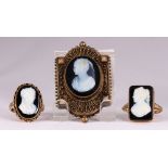 (Lot of 3) Onyx cameo and yellow gold jewelry Including 1) onyx cameo and 14k yellow gold ring, size