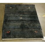Tibetan carpet, 2'2" x 2'10"