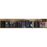 One shelf of (12) transistor radios, and (2) Walkmen, some with original boxes