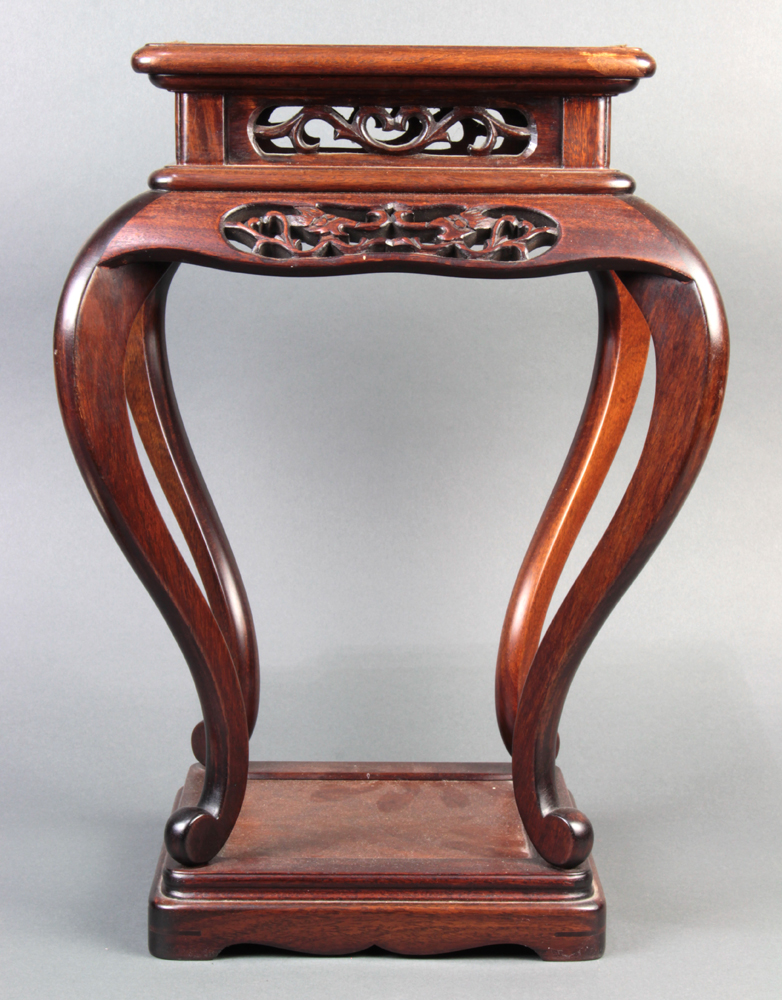 Chinese wood stand, with a square top and a pierced apron, raised on cabriole supports on a square